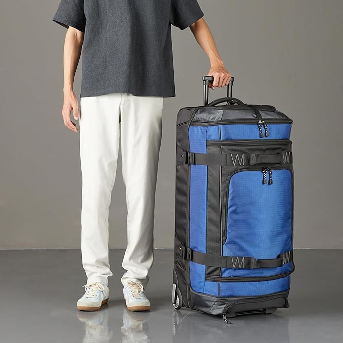 Amazon Basics 35-Inch Large Rolling Duffle Bag with Wheels and Handle, Travel Duffle Bag with Durable Ripstop Polyester Material, 2 Layers of Space, Multiple Interior and Exterior Pockets, Blue